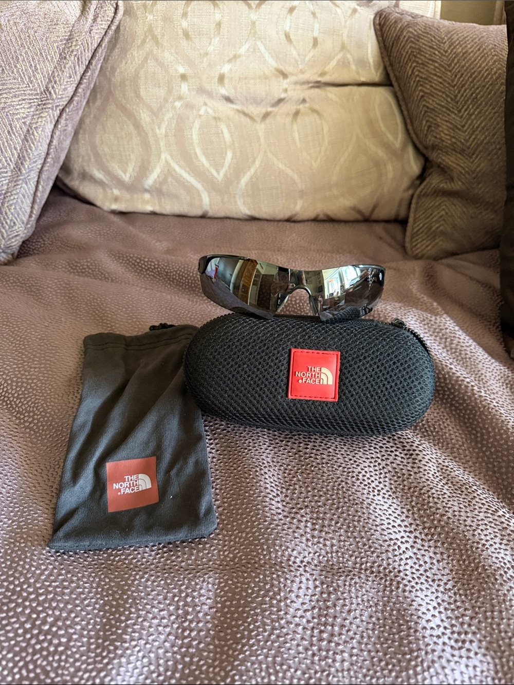 The North Face Black Sunglasses with Mirrored Lenses and Red Logo Case